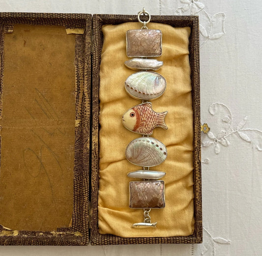 Silver with shells, pearl, and fish etched stone Bracelet
